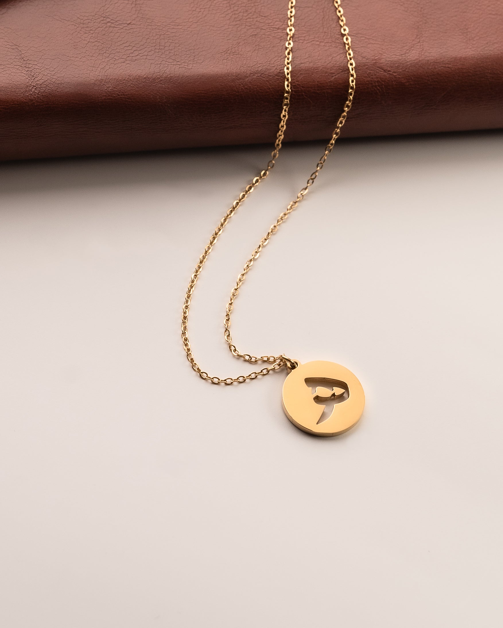 Initial Necklace ھ