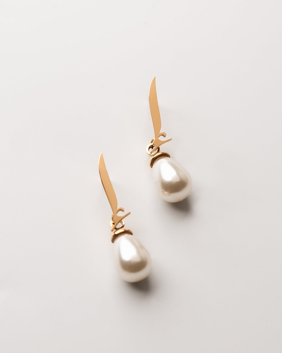 Calligraphed Letter Earrings إ